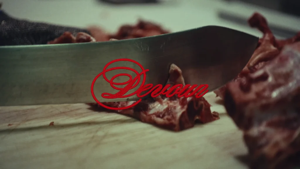 Rêve Devour official video screenshot at 0:05.