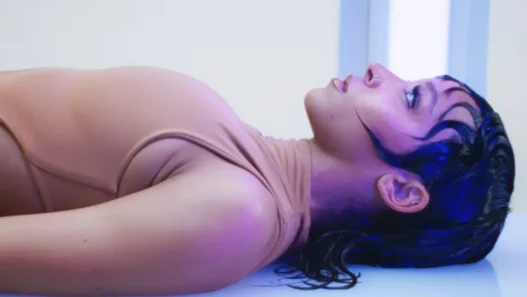 Tinashe appearing in the opening scene of her Too Easy official music video