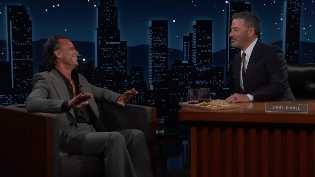 Walton Goggins smiling during his Jimmy Kimmel Live interview about Spain and the World Cup