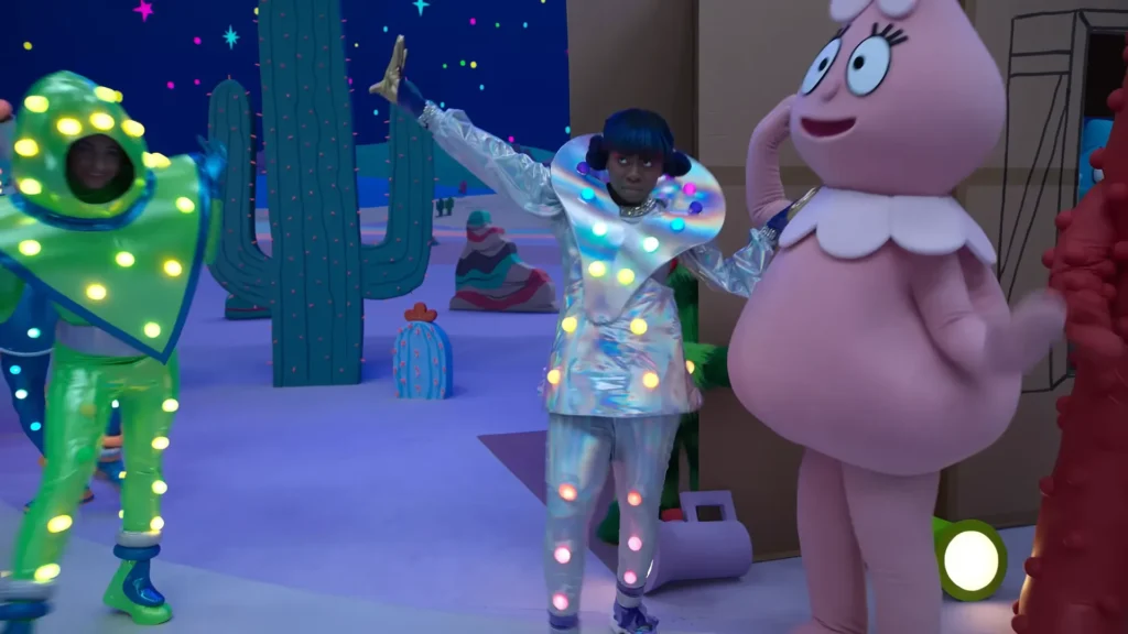 Hemlocke Springs performing with colorful characters in Yo Gabba GabbaLand