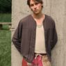 Anarcius Jean wearing an olive floral lace camp shirt for the &Kin by Kith Summer 2026 collection
