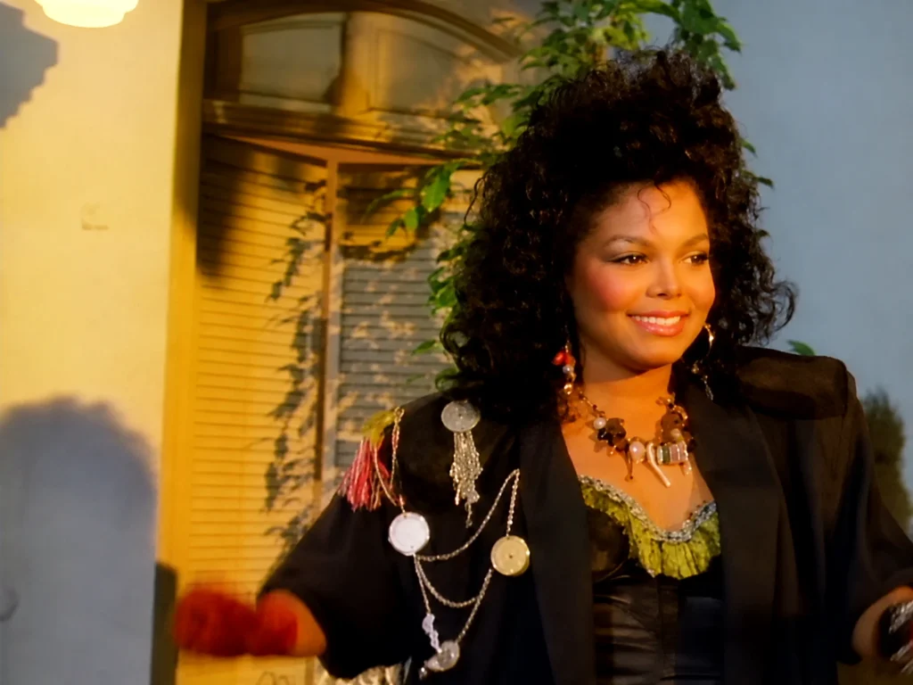 Janet Jackson smiles in a restored frame from the When I Think of You music video