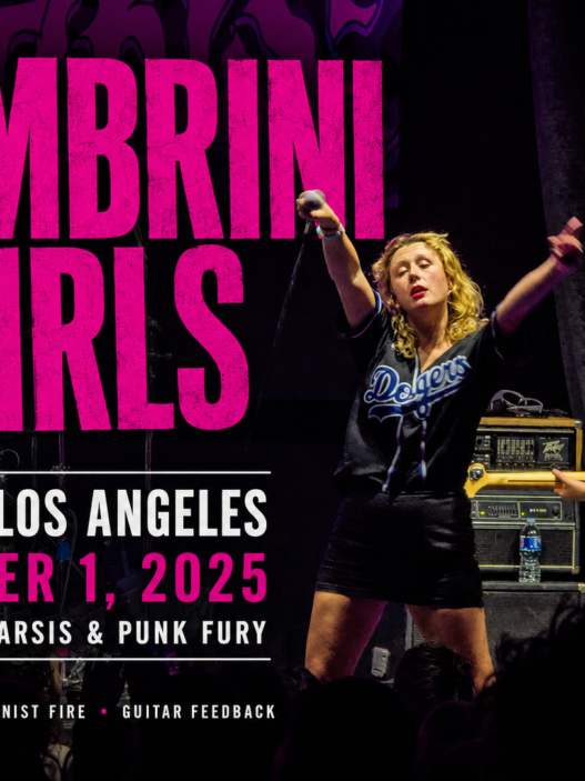 Lambrini Girls perform live in Los Angeles on October 1, 2025, delivering a chaotic, cathartic punk set filled with queer rage, feminist fire, and guitar feedback.