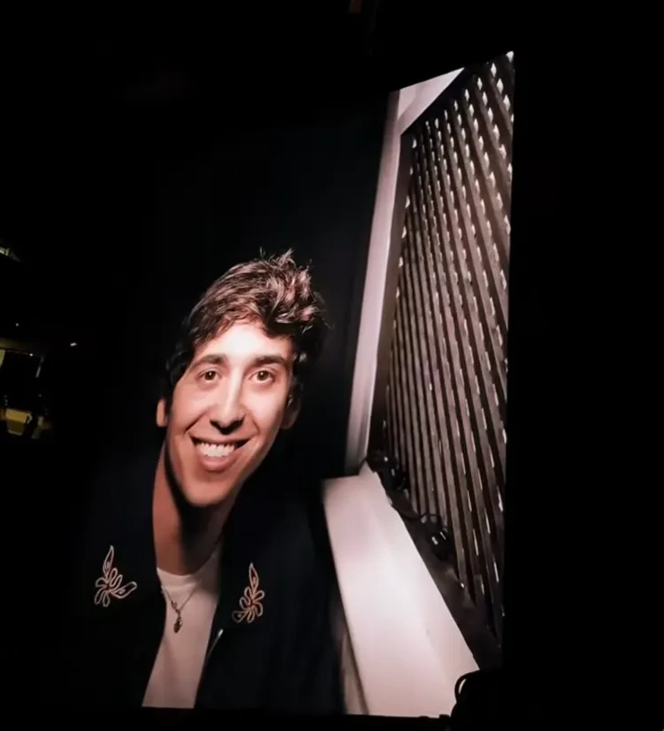 Marcello Hernández reacting during his Rosalía LUX Tour confession in New York City