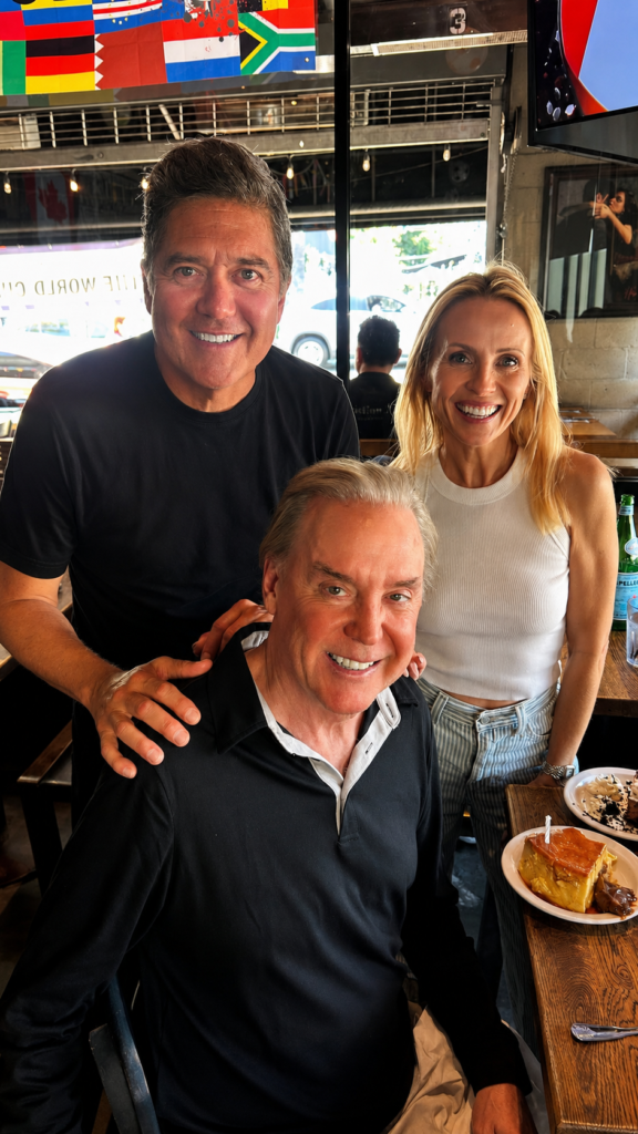Mark Kriski with Frank Buckley and Jessica Holmes at his KTLA birthday lunch dessert moment.