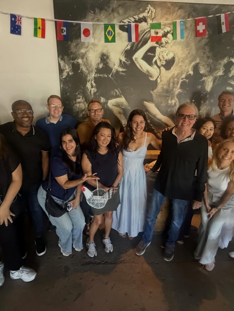 Mark Kriski with KTLA colleagues in a birthday lunch group photo.