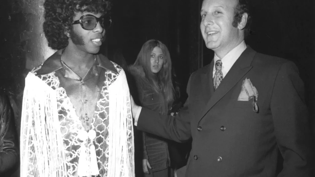 Clive Davis with Whitney Houston during a music-industry moment.
