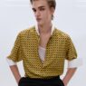 Model wearing sharp tailoring from Haider Ackermann's Tom Ford Fall 2026 menswear collection