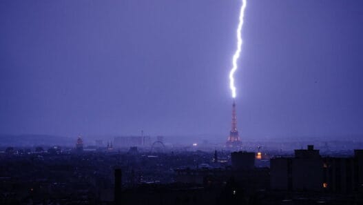 Paris thunderstorm sky near the Eiffel Tower during a lightning strike