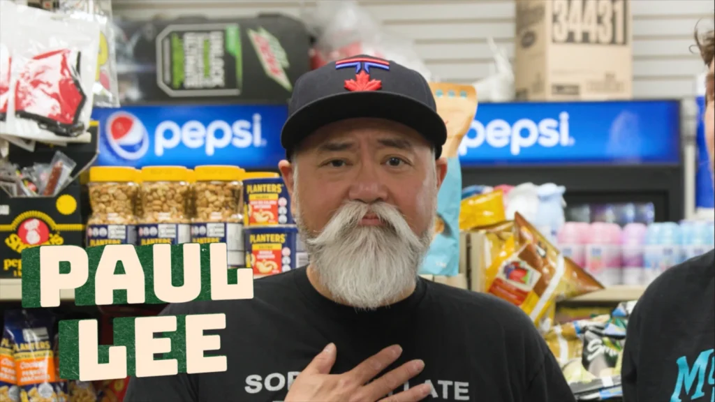 Paul Sun-Hyung Lee and Jay Mewes mix fountain drinks inside a convenience store
