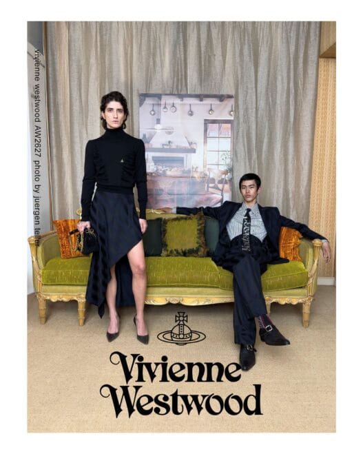 Model wears layered Vivienne Westwood Fall Winter 2026 fashion inside the ornate Belloni showroom in Italy