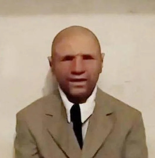 Masked man known as Alexander Smith appears in a viral time-traveler interview claiming he visited the year 2118.