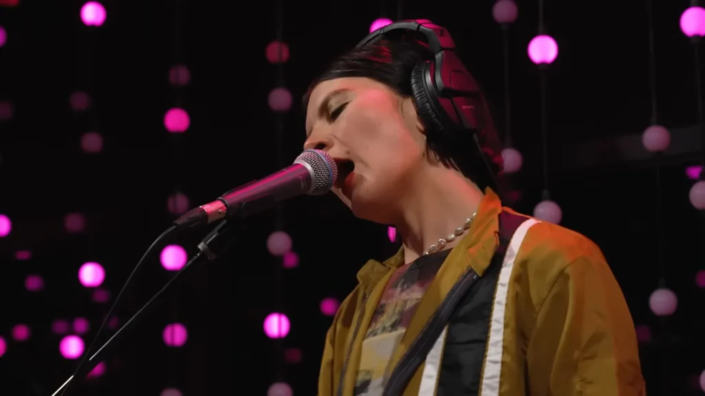 Automatic performs beneath the red KEXP studio sign