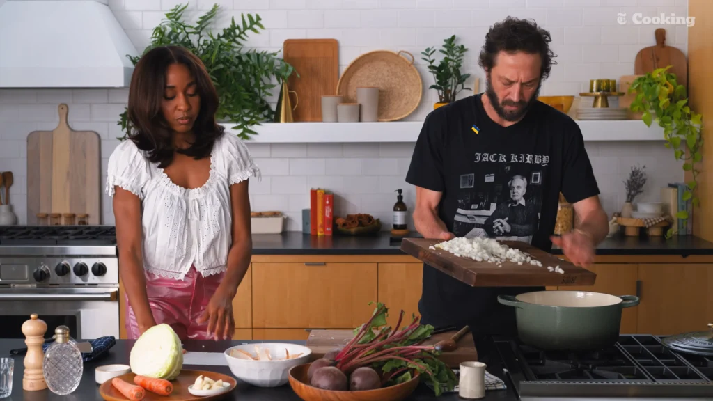 Ebon Moss-Bachrach demonstrating how he prepares beets for the family borscht recipe