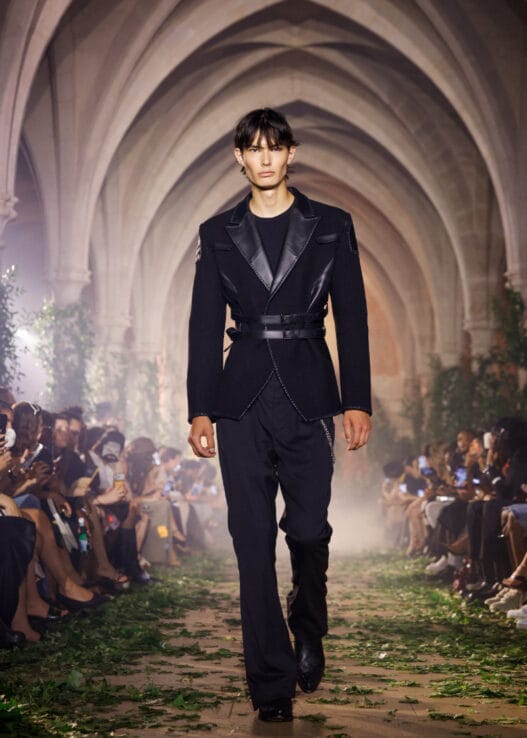 Model wears a sculptural black look from PAZ Spring/Summer 2027 at Paris Fashion Week.