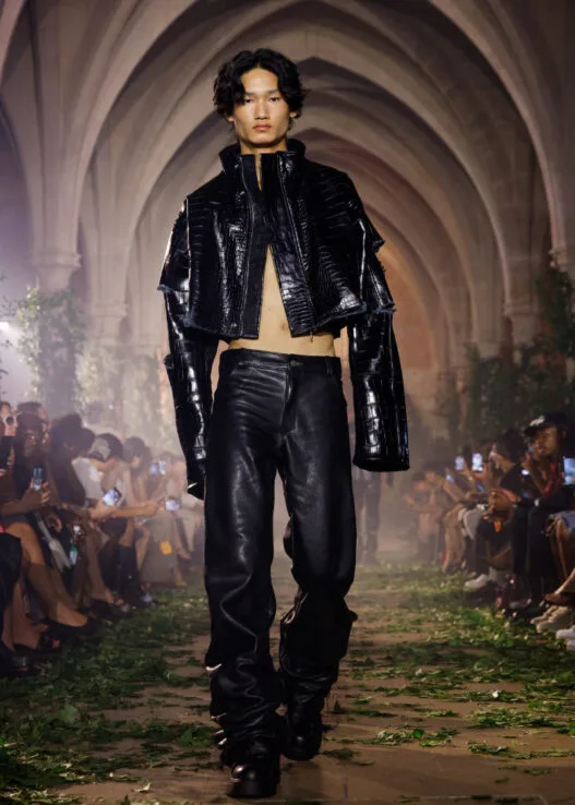 Model wears a sculptural look from PAZ Spring/Summer 2027 “Beyond Our Time” at Collège des Bernardins during Paris Fashion Week.