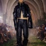 Model wears a sculptural look from PAZ Spring/Summer 2027 “Beyond Our Time” at Collège des Bernardins during Paris Fashion Week.