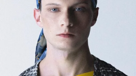 Model Ben Ryan posing in David Sierra’s QUE3R menswear editorial