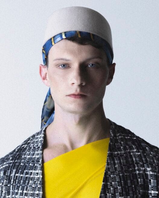 Model Ben Ryan posing in David Sierra’s QUE3R menswear editorial