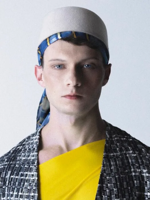 Model Ben Ryan posing in David Sierra’s QUE3R menswear editorial