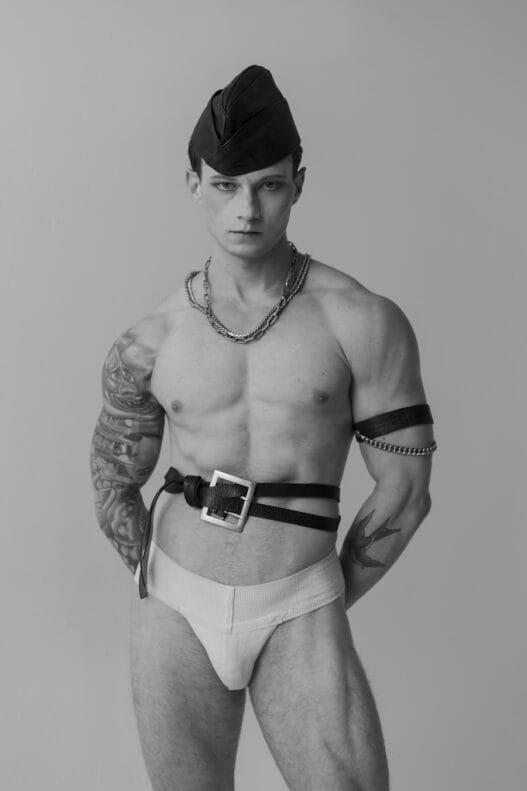 Model Ben Ryan posing in David Sierra’s QUE3R menswear editorial