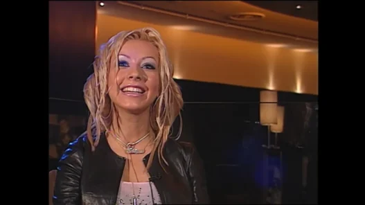 Christina Aguilera speaking during a Much Rewind interview about fame, burnout, and making three albums at once.