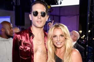 Britney Spears smiling beside G-Eazy backstage during the 2016 Make Me era