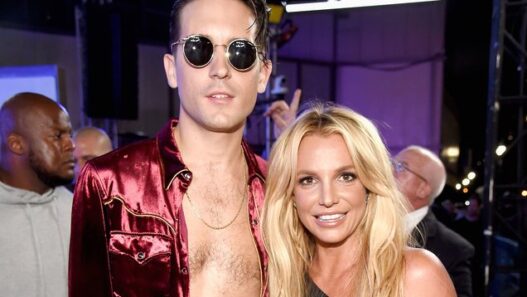 Britney Spears smiling beside G-Eazy backstage during the 2016 Make Me era