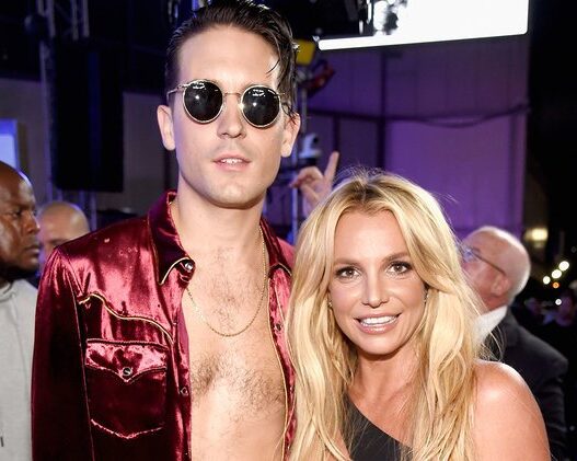 Britney Spears smiling beside G-Eazy backstage during the 2016 Make Me era