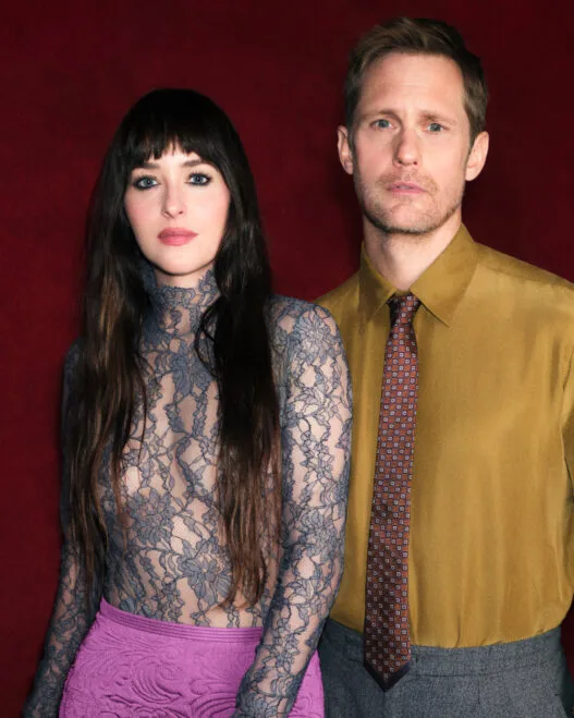 Dakota Johnson appears in a Valentino Beauty portrait for the brand’s new fragrance era with Alexander Skarsgård.