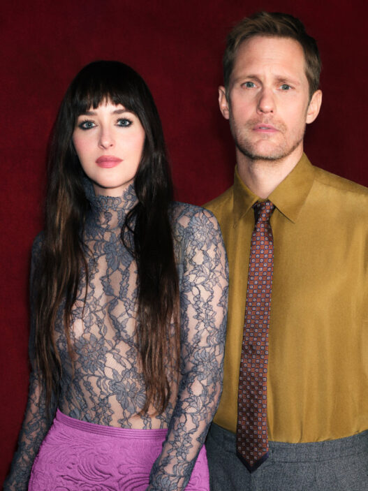 Dakota Johnson appears in a Valentino Beauty portrait for the brand’s new fragrance era with Alexander Skarsgård.