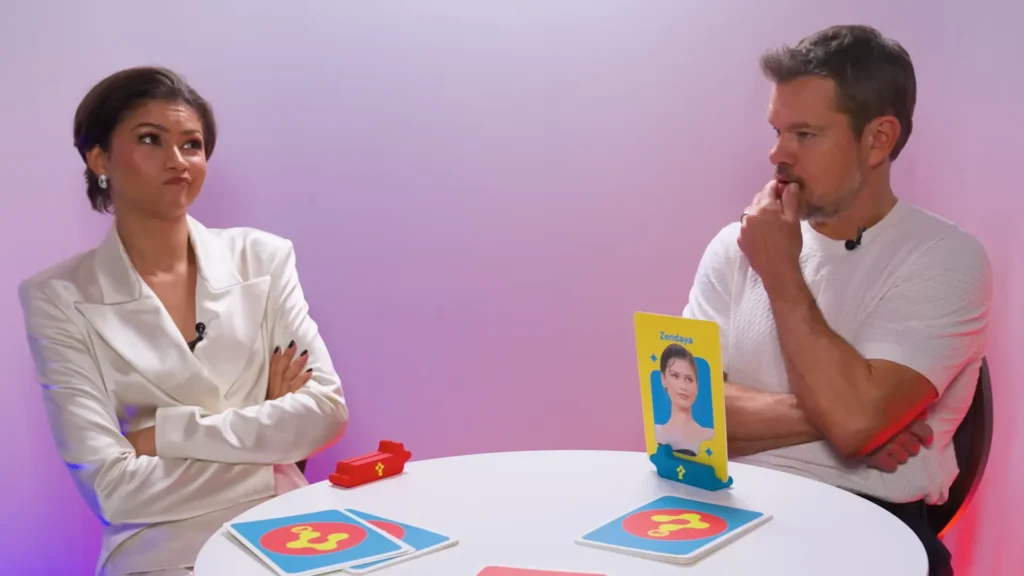 Robert Pattinson reacts while playing Who Even Am I with The Odyssey cast