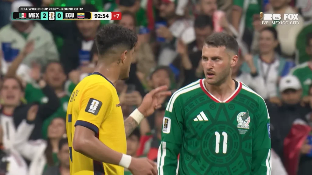 Close-up highlight still from Ecuador vs. Mexico in the 2026 FIFA World Cup Round of 32.