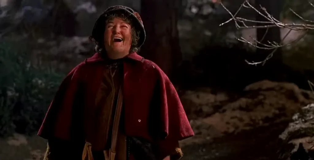 Brenda Fricker’s Pigeon Lady throws birdseed at Harry and Marv in Home Alone 2