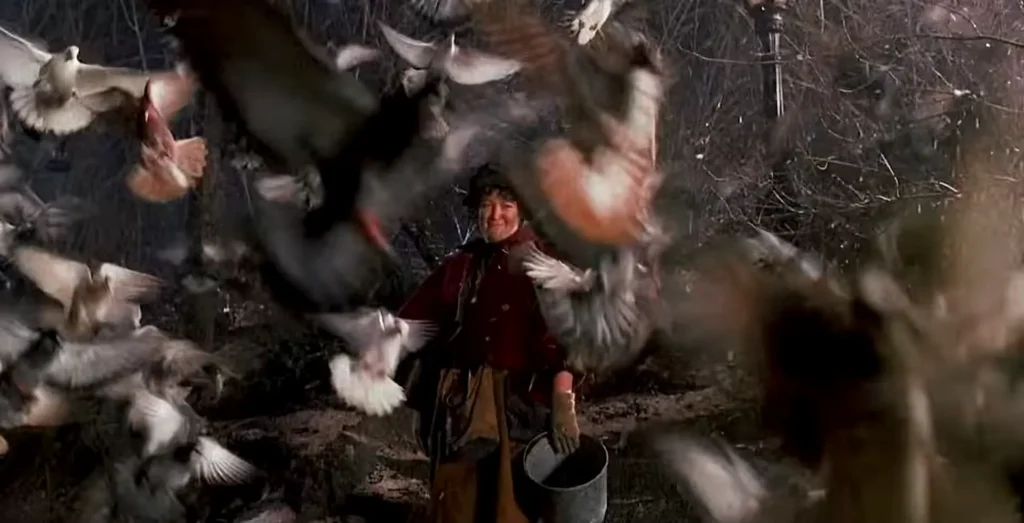 Brenda Fricker as the Pigeon Lady speaks with Kevin in Home Alone 2: Lost in New York