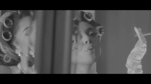 Jaz Karis in a warm, intimate visual still from The Waiting Line official music video.