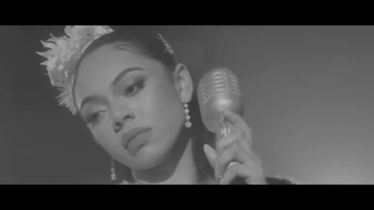 Jaz Karis appears in a still from her official music video for The Waiting Line.