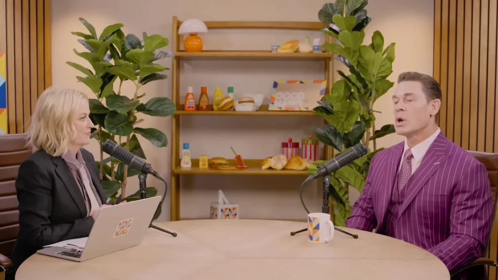 John Cena speaking with Amy Poehler during an episode of the Good Hang podcast
