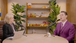 John Cena speaking with Amy Poehler during an episode of the Good Hang podcast