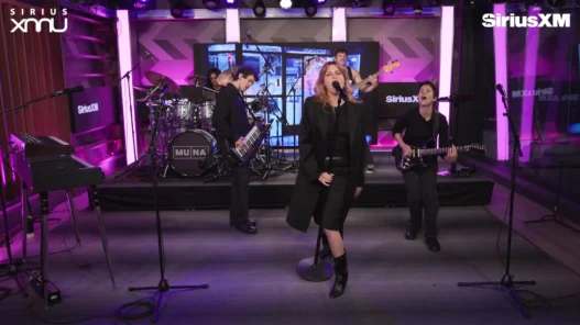 MUNA performing Wannabeher live during a SiriusXM studio session