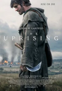 Andrew Garfield appears bloodied and battle-worn as Ploughman in The Uprising