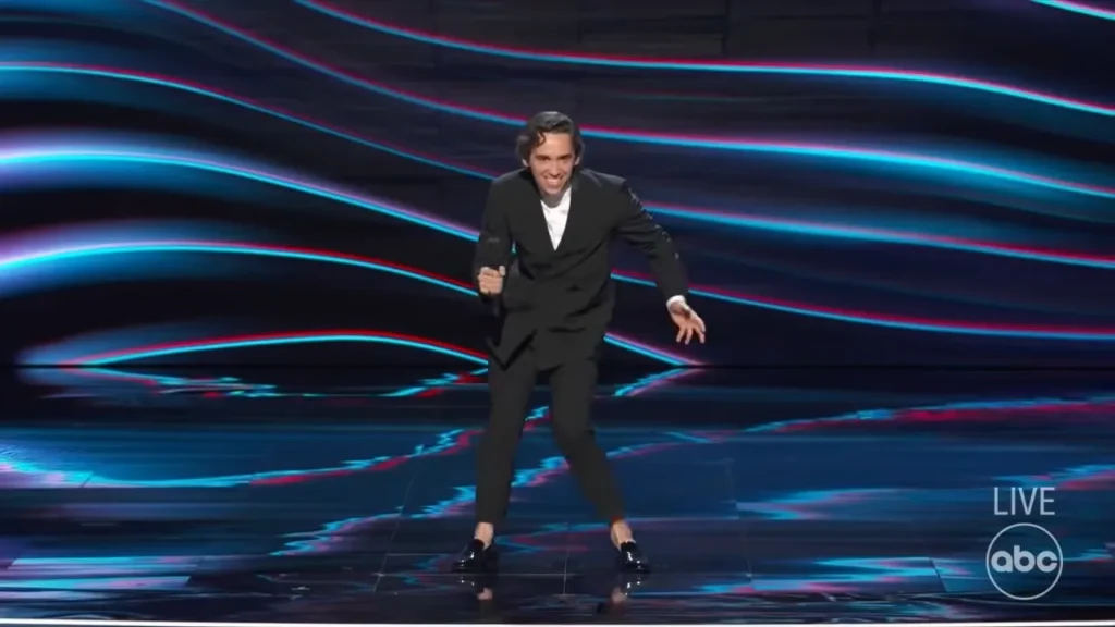 Marcello Hernandez acts out a dramatic hockey official during his ESPYS monologue