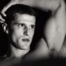 Matt van de Sande posing in an intimate portrait photographed by Giuseppe Riserbato
