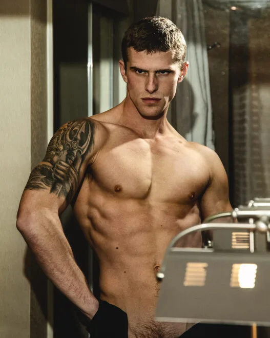 Matt van de Sande posing in an intimate portrait photographed by Giuseppe Riserbato