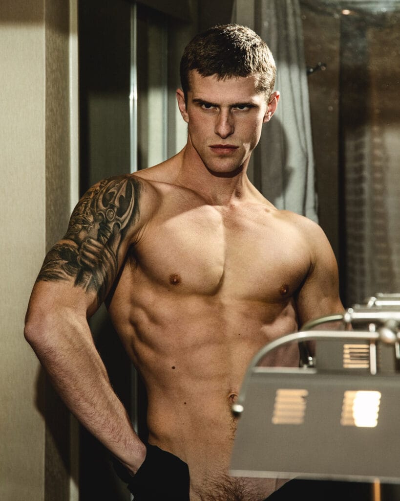 Matt van de Sande posing in an intimate portrait photographed by Giuseppe Riserbato