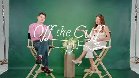 Millie Bobby Brown and Louis Partridge sit together for Vogue’s Off the Cuff rapid-fire questions video.