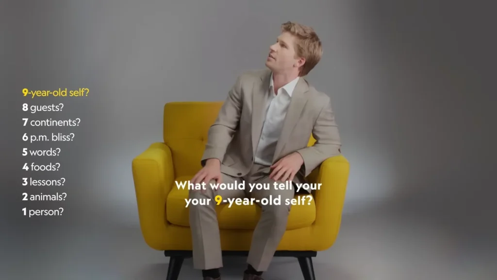 Robert Irwin giving an expressive answer from National Geographic’s yellow chair