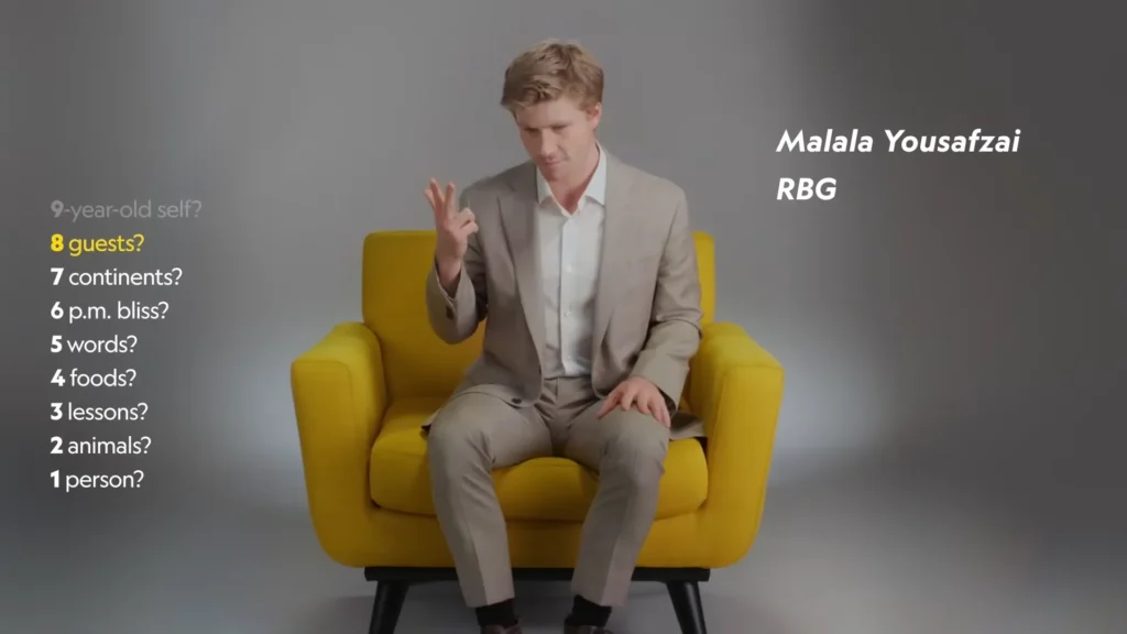 Robert Irwin gesturing while answering one of National Geographic’s nine yellow-chair questions