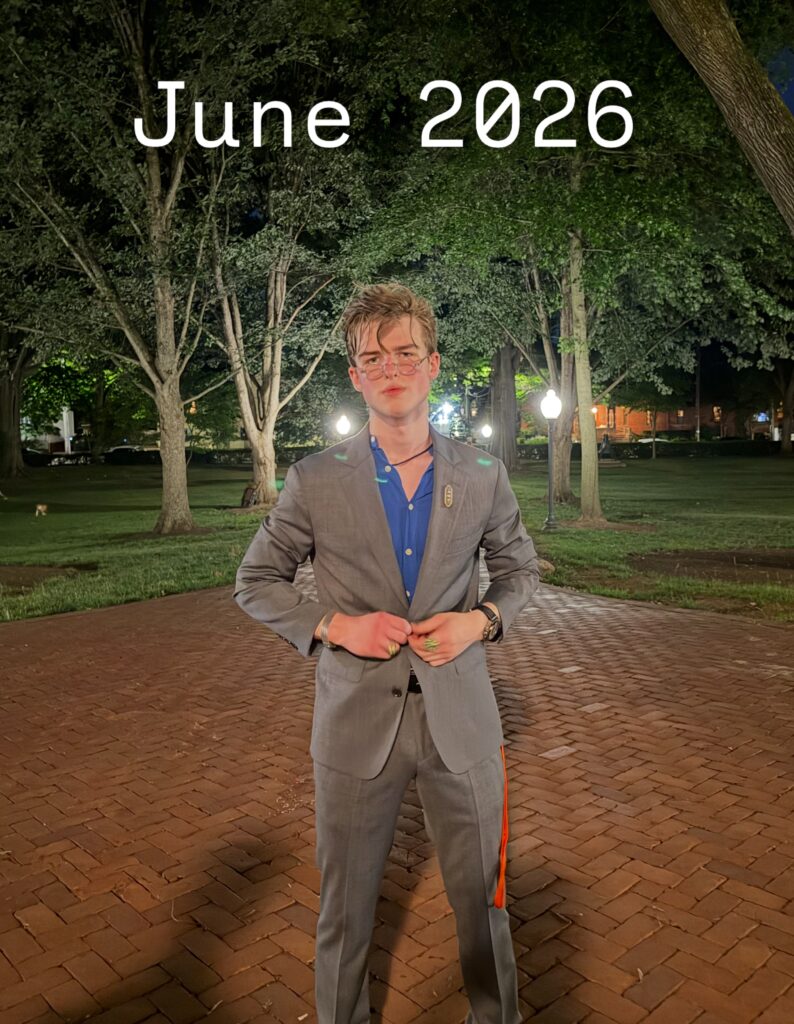 Iain Armitage wearing a gray suit outdoors at night in his June 2026 birthday countdown photo