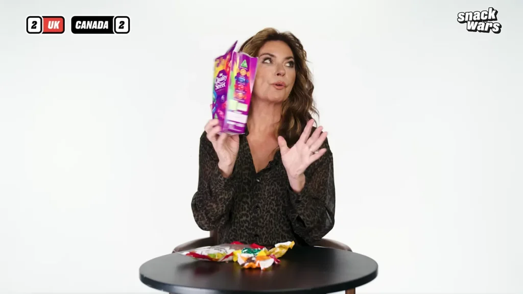 Shania Twain gives her verdict near the end of the Snack Wars episode